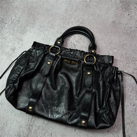 miu miu bow bag prices|miu miu bag vintage.